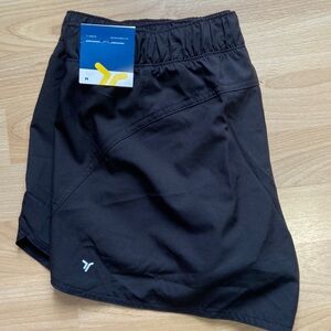 New! Old Navy size medium quick dry lined shorts.
